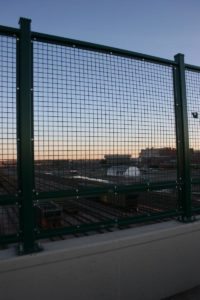 AmeriFence Corporation of Salina - Welded wire mesh on top of a pedestrian bridge